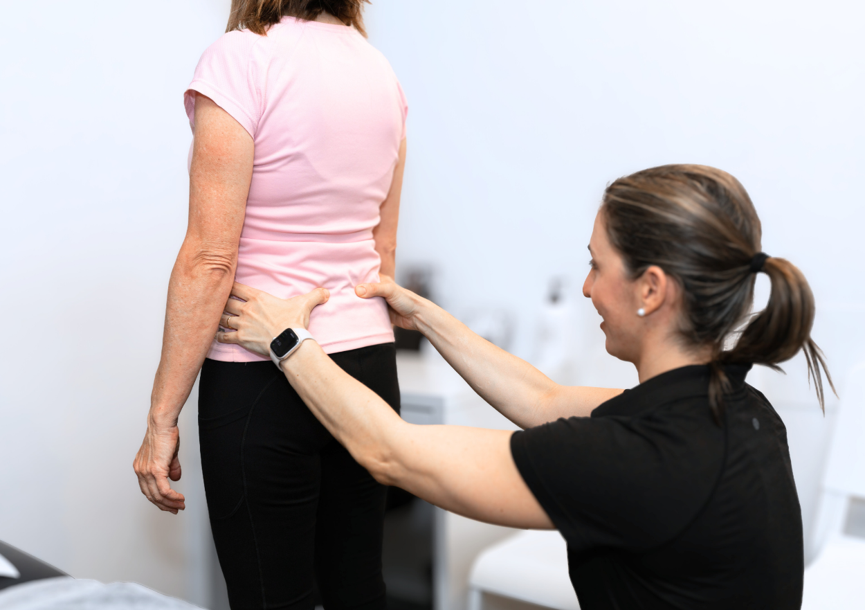 Physiotherapist assessing a patient during an initial consultation at Forge West End