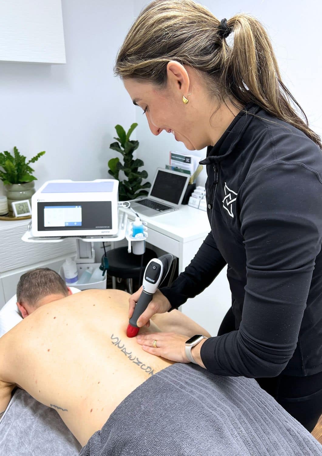 Shockwave therapy being applied at Forge West End, Brisbane
