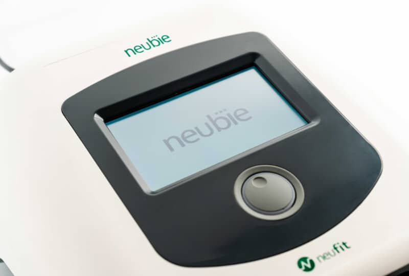 Close-up of the Neubie neuromuscular electrical stimulation device by NeuFit at Forge West End