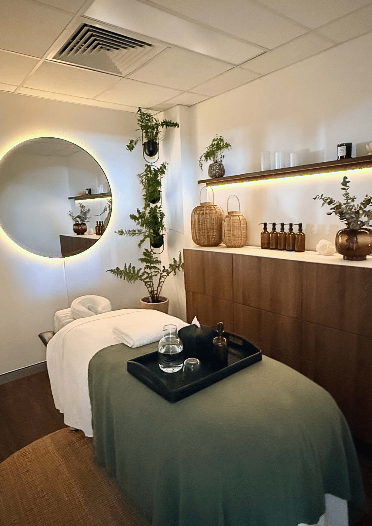 Private remedial massage treatment room at Forge West End, with treatment table and warm lighting